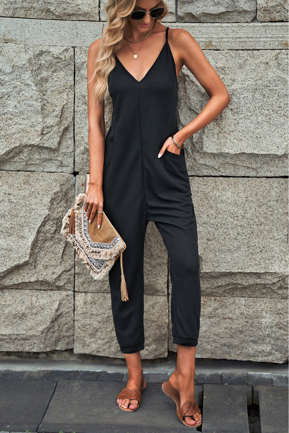 Grijze, getextureerde, mouwloze, V-hals, casual jumpsuit met zakken