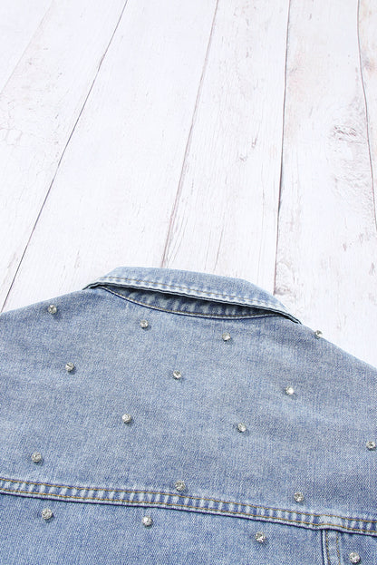 Mistblauwe spijkerjas met steentjes en studs