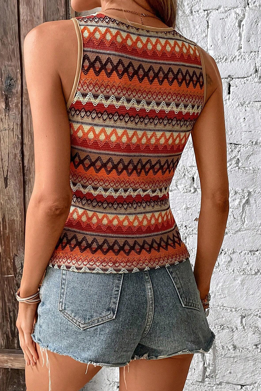 Oranje gestreepte en geo-jacquard gebreide tanktop