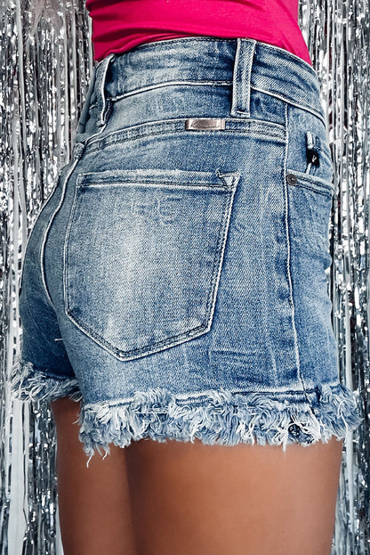 Blauwe skinny denim shorts met hoge taille en ruwe zoom