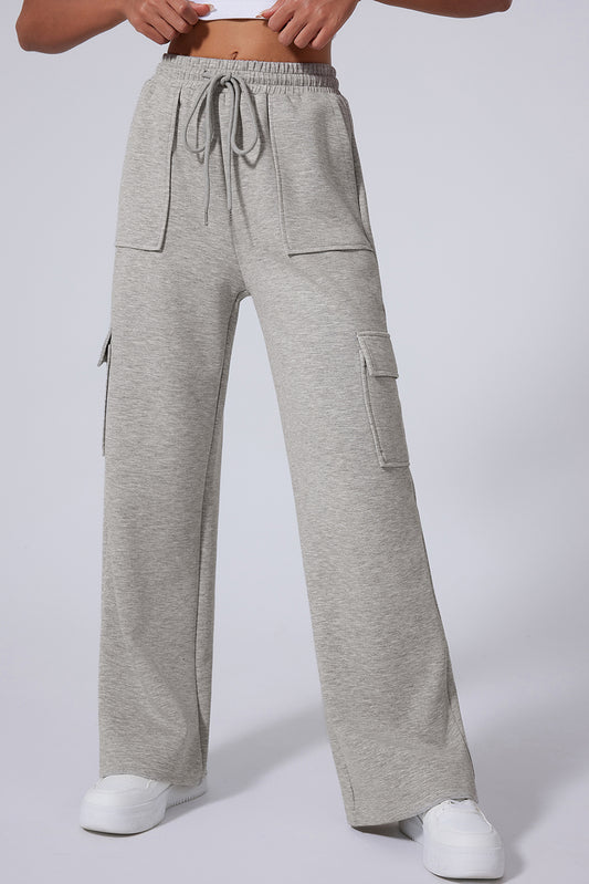 Pantalon d'entraînement gris clair à jambes larges et taille haute à lacets et poches multiples