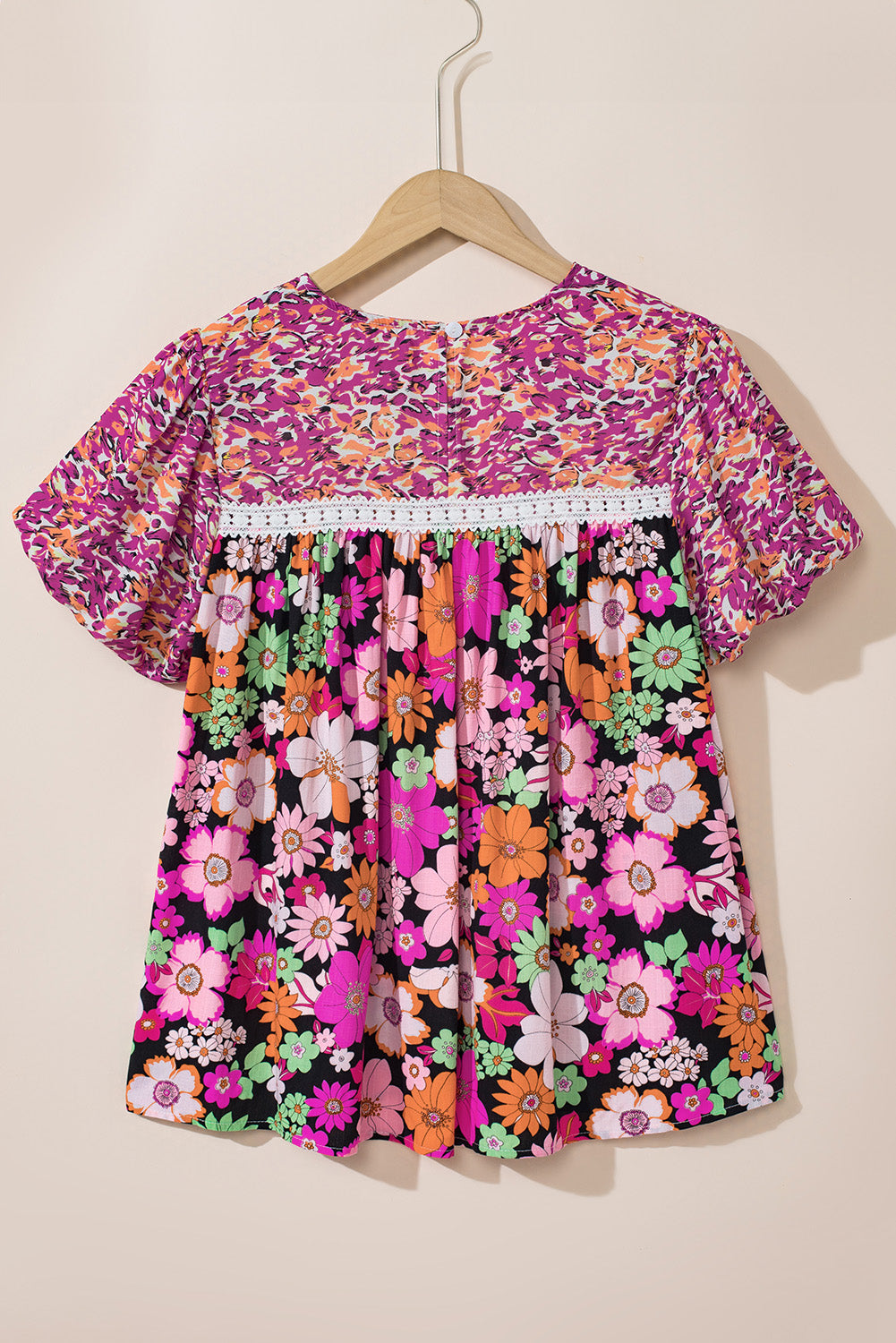 Rozerode bubbelmouw kantversiering bloemenmix blouse