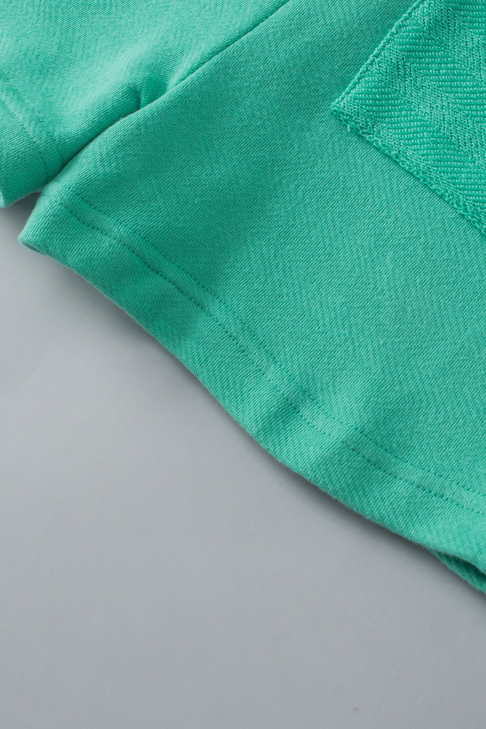 Mintgroene geknoopte bandjes French Terry Romper