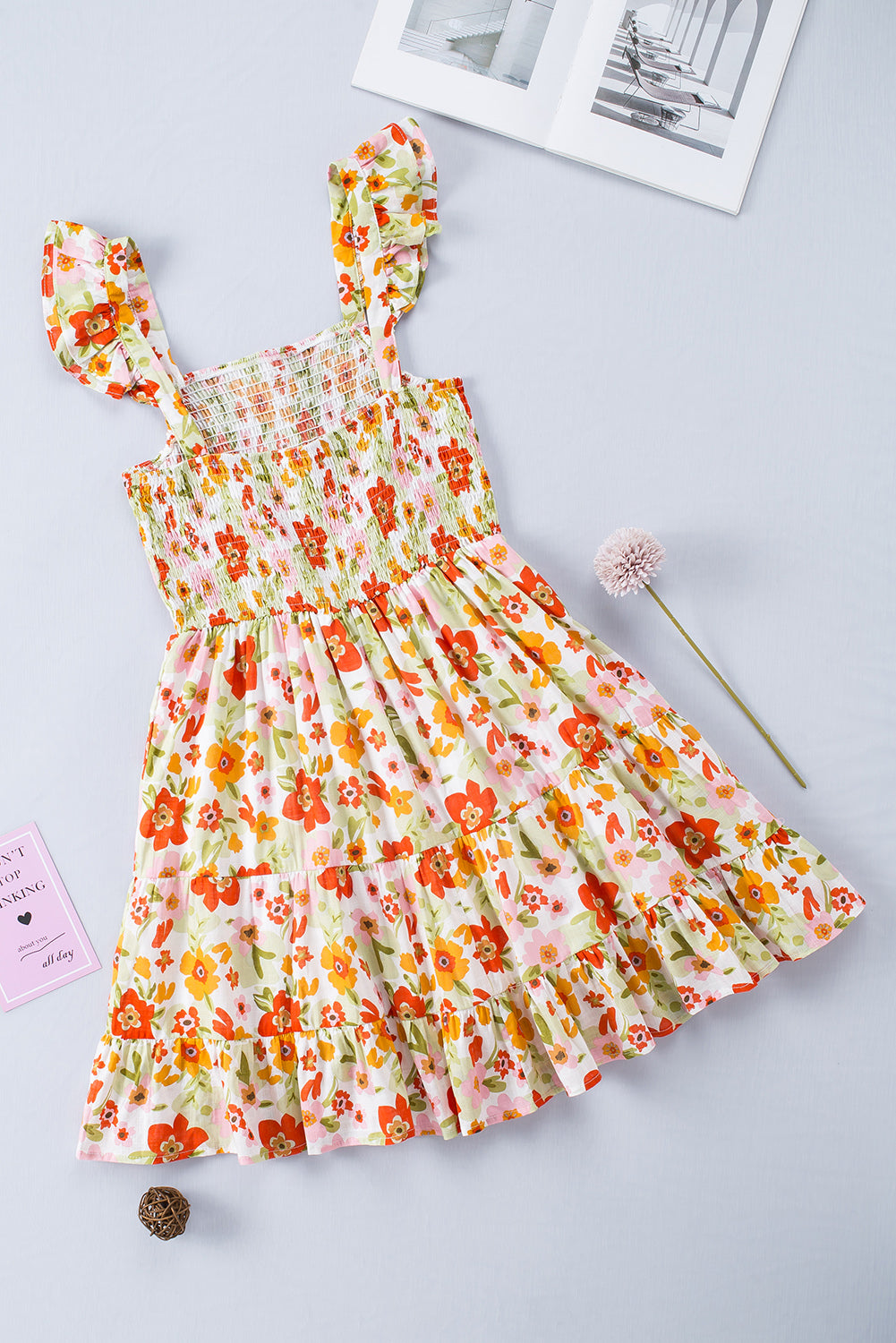 Veelkleurige gegolfde, mouwloze mini-jurk met hoge taille en bloemen