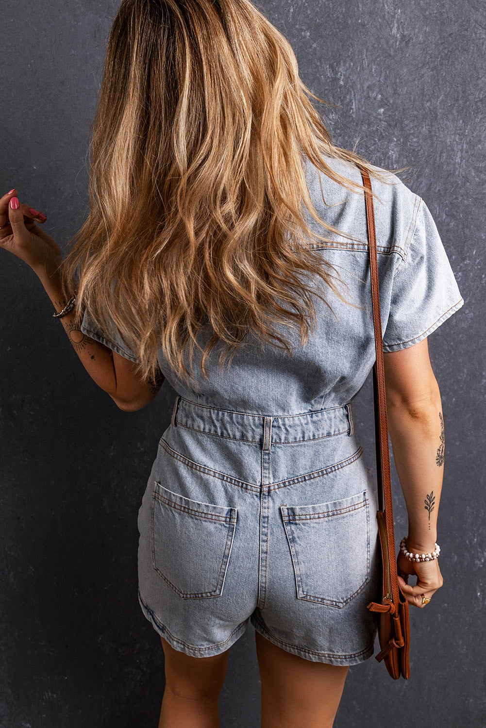 Lichtblauwe vintage gewassen knopen denim romper met zakken