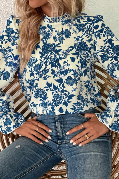 Blouse met bloemenprint, volantmouwen en sleutelgatrug in hemelsblauw