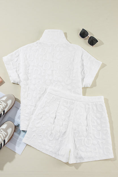 Set van witte luipaardjacquard-T-shirt en korte broek met kwartrits