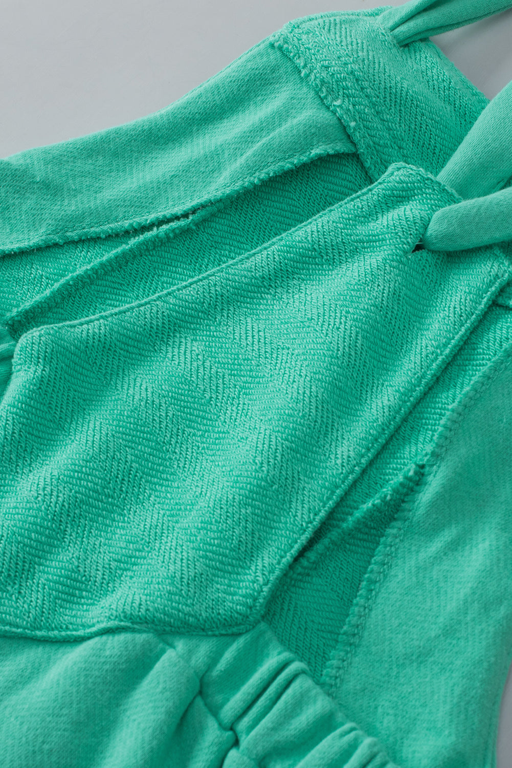 Mintgroene geknoopte bandjes French Terry Romper