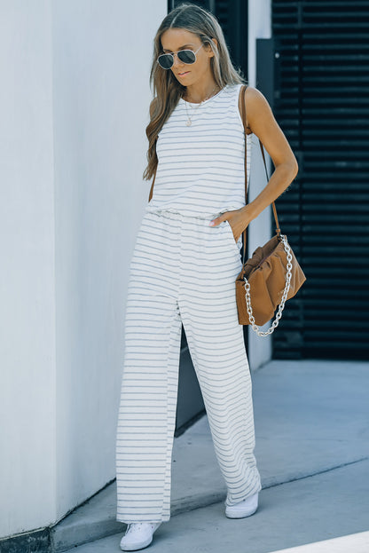 Witte gestreepte jumpsuit met zakken en mouwen