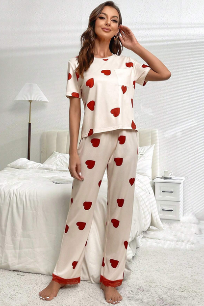 Ensemble pyjama blanc avec t-shirt et pantalon à ourlet en dentelle et imprimé cœur pour la Saint-Valentin