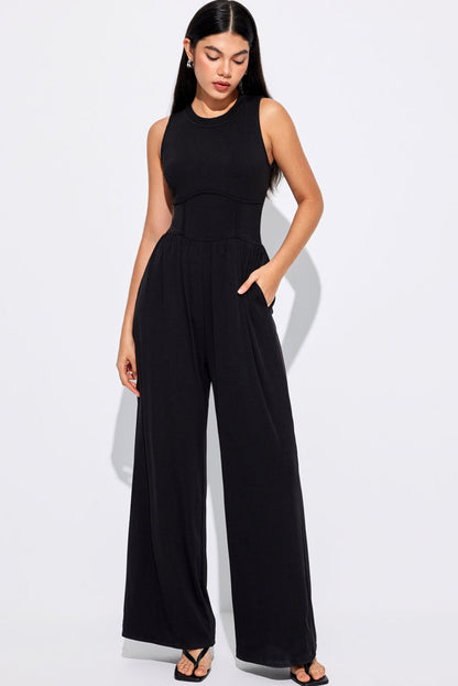 Zwarte jumpsuit met wijde pijpen en een strakke taille zonder mouwen