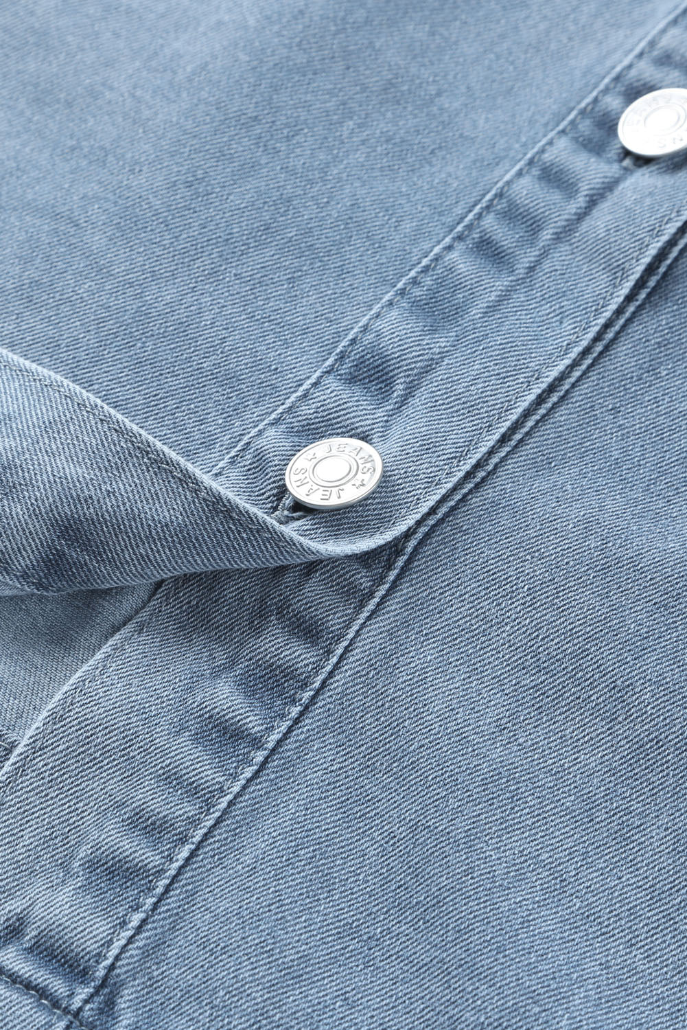 Hemelsblauwe geknoopte denim mini-jurk met lange mouwen