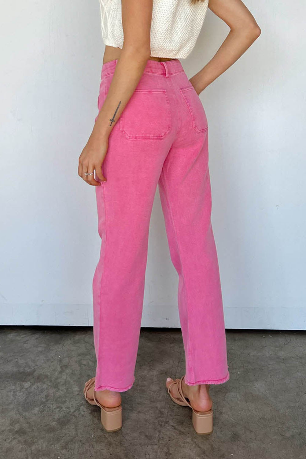 Roze enkellange flared jeans met ruwe zoom