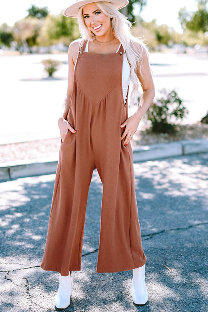 Zwarte jumpsuit met wijde pijpen en geknoopte bandjes