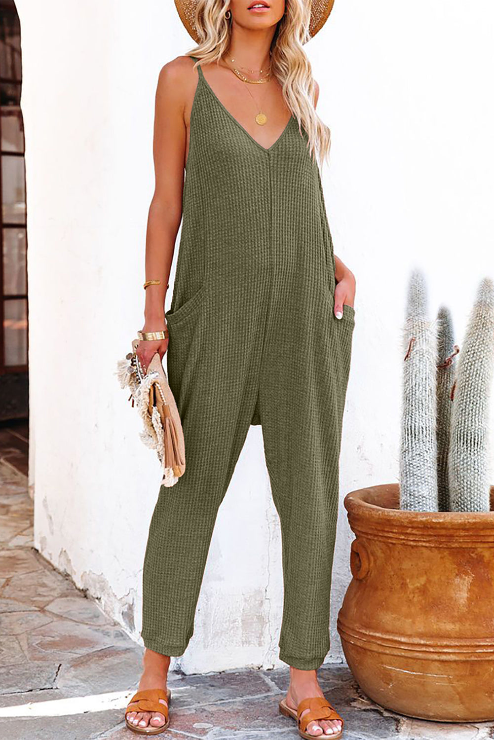 Grijze, getextureerde, mouwloze, V-hals, casual jumpsuit met zakken