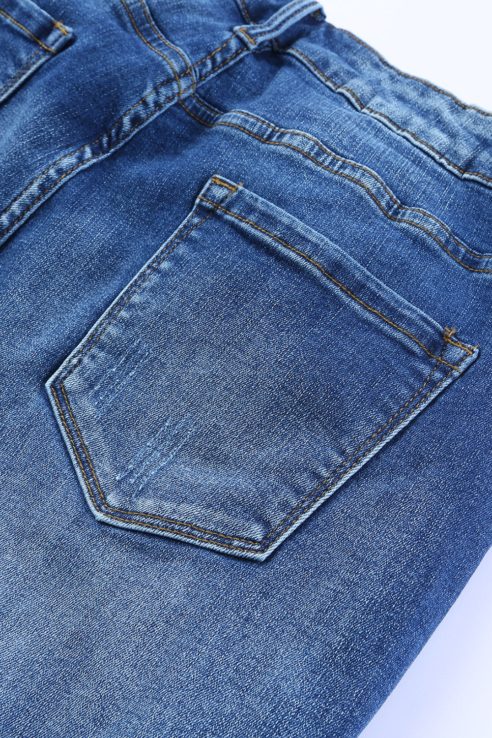 Blauwe skinny jeans met ruwe zoom tot op de enkel