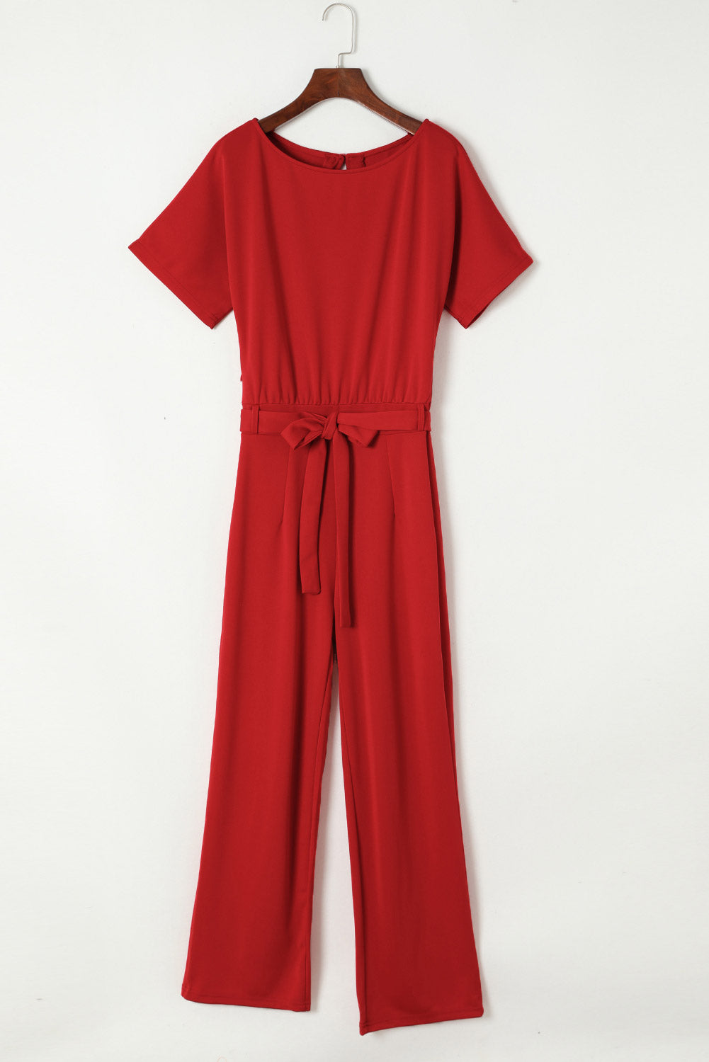 Blauwe jumpsuit met wijde pijpen en riem