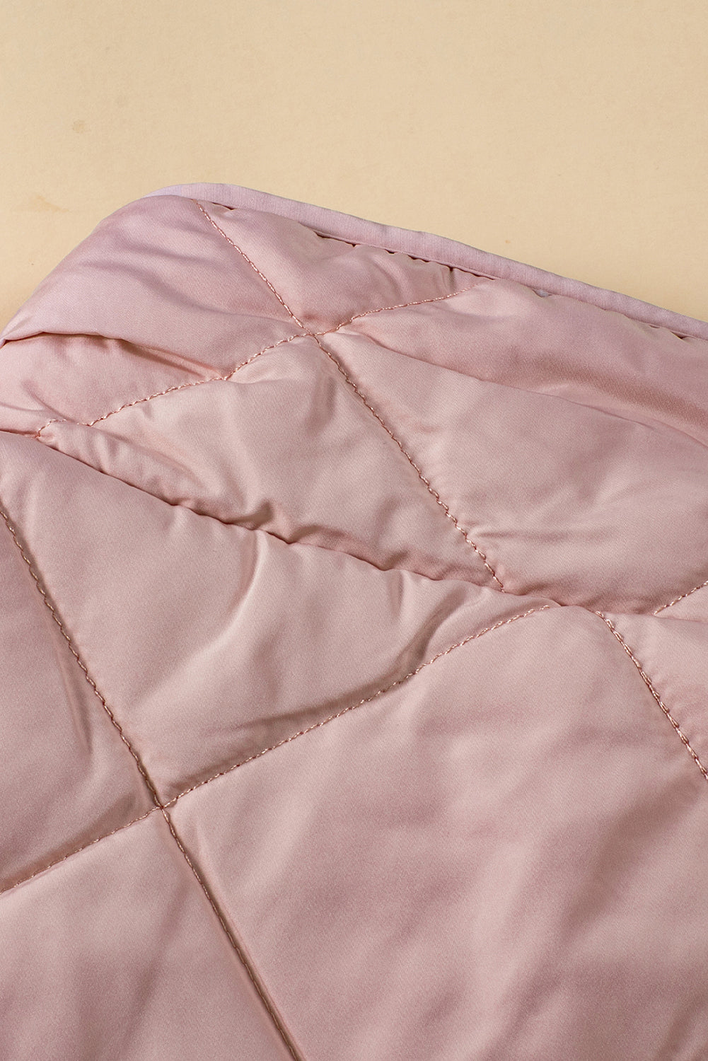 Roze fleece gevoerde gewatteerde vestjassen