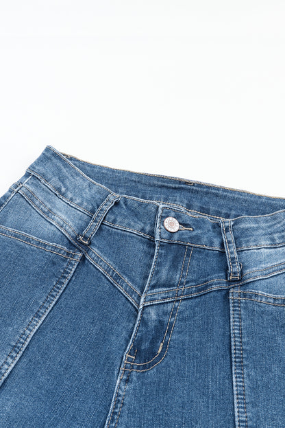 Blauwe jeans met hoge taille en naden en stiksels en flared zakken