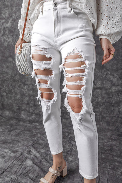 Witte gescheurde jeans met hoge taille en scheuren