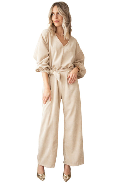 Abrikoos sleutelgat rug V-hals strik taille losse jumpsuit