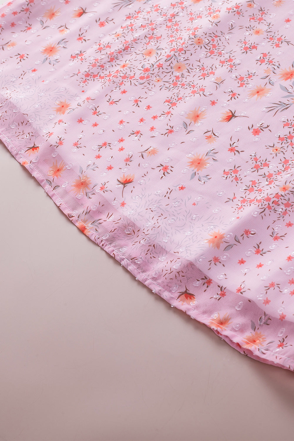 Roze mouwloze top met trekkoord en ruches met bloemenprint