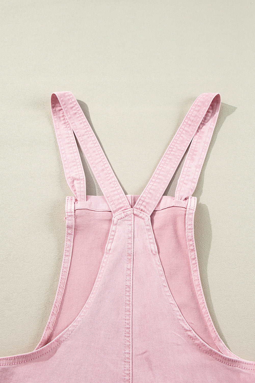 Roze effen denim romper met knoopbandjes en zakken