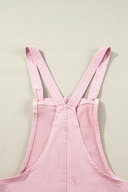 Roze effen denim romper met knoopbandjes en zakken