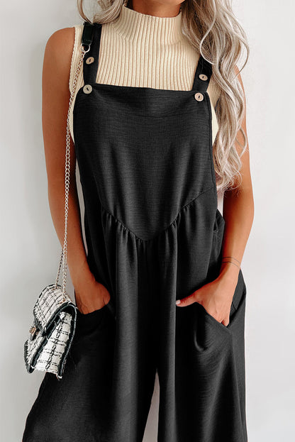 Zwarte jumpsuit met wijde pijpen en geknoopte bandjes