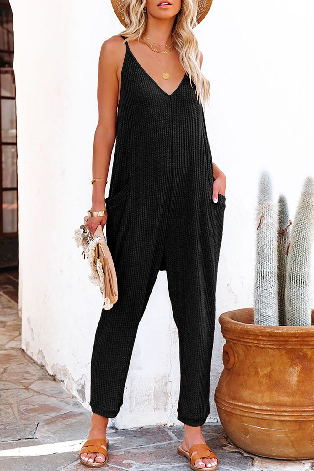 Grijze, getextureerde, mouwloze, V-hals, casual jumpsuit met zakken