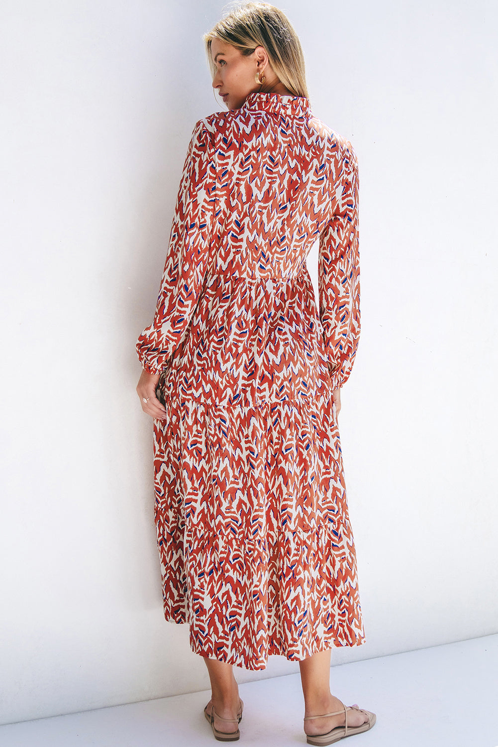 Oranje abstracte print V-hals geplooide hoge taille midi-jurk